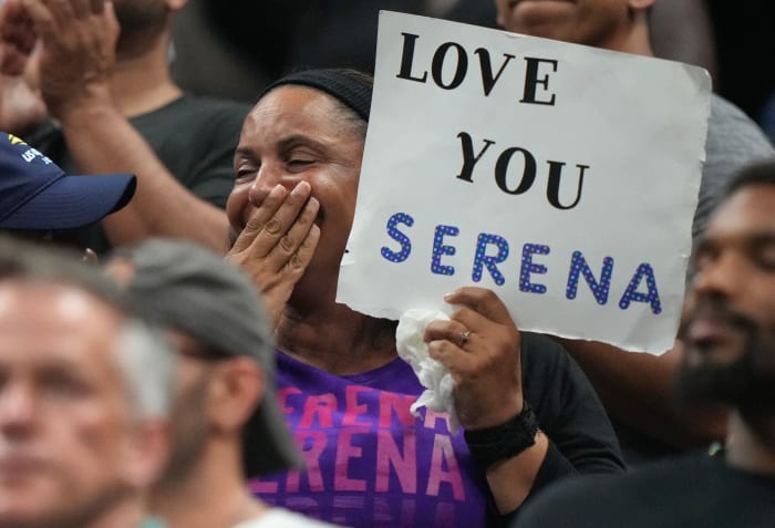 A fan watches Serena Williams during the first round of the 2022 U.S. Open